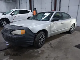 2005 Pontiac Grand Am SE with VIN 1G2NE52E25M168028, listed as a IAAI auction lot 41457663 with 174,933 mi miles. Bid and sale history available at carsss.com. Image 2.