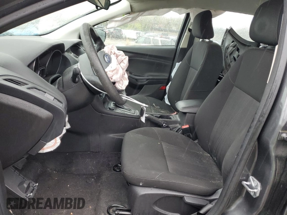 2018 Ford Focus SE with VIN 1FADP3F29JL206477, listed as a Copart auction lot 50410345 with 70,955 mi miles and Salvage Title. Bid and sale history available at DreamBid. Image 7.