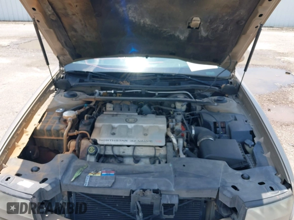 1999 Cadillac DeVille z VIN 1G6KD54Y2XU788781, wystawiony jako IAAI lot #42390531 z przebiegiem 180 328 mil mil oraz . Historia ofert i sprzedaży dostępna na DreamBid. Obrazek 10.