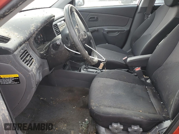 2008 Kia Rio LX with VIN KNADE123486315485, listed as a Copart auction lot 46528395 with 140,976 mi miles and Salvage Title. Bid and sale history available at DreamBid. Image 7.