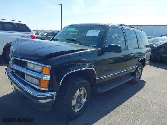 1999 Chevrolet Tahoe Z71 with VIN 1GNEK13R3XJ460393, listed as a IAAI auction lot 41773500 with 148,691 mi miles. Bid and sale history available at carsss.com. Image 17.