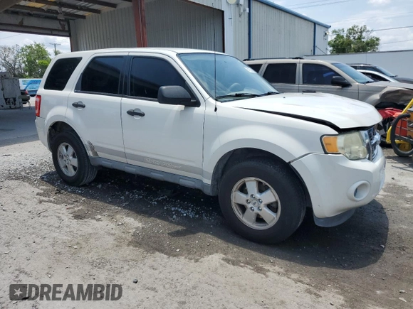 2011 Ford Escape XLS with VIN 1FMCU9C74BKC30951, listed as a Copart auction lot 57912165 with 159,079 mi miles and Salvage title. Bid and sale history available at DreamBid. Image 4.