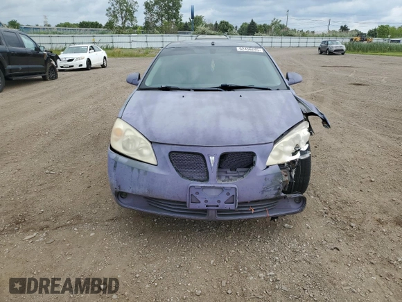 2009 Pontiac G6 1SA with VIN 1G2ZG57N894143600, listed as a Copart auction lot 62456245 with 105,649 mi miles and Salvage title. Bid and sale history available at DreamBid. Image 5.