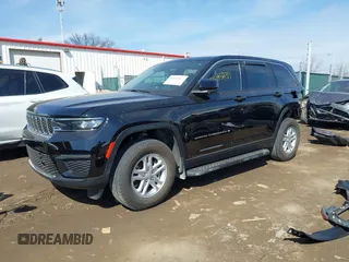 2023 Jeep Grand Cherokee Laredo with VIN 1C4RJHAG7PC600196, listed as a IAAI auction lot 41695837 with 19,110 mi miles and . Bid and sale history available at DreamBid. Image 21.