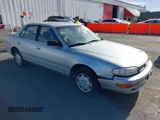 1994 Toyota Camry LE z VIN JT2SK12E0R0209312, wystawiony jako IAAI lot #42197159 z przebiegiem 270 657 mil mil oraz . Historia ofert i sprzedaży dostępna na DreamBid. Obrazek 1.