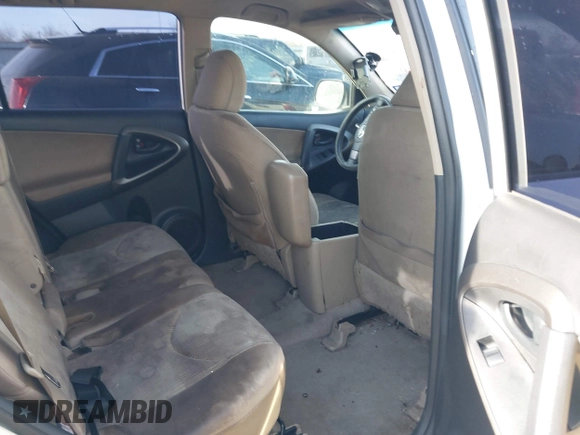 2009 Toyota RAV4 with VIN JTMZF33V09D005560, listed as a IAAI auction lot 41819622 with 276,849 mi miles. Bid and sale history available at carsss.com. Image 8.