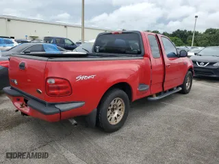 2003 Ford F-150 XL with VIN 1FTRX07243KB72082, listed as a Copart auction lot 74593004 with 0 mi miles and Salvage Title. Bid and sale history available at carsss.com. Image 3.