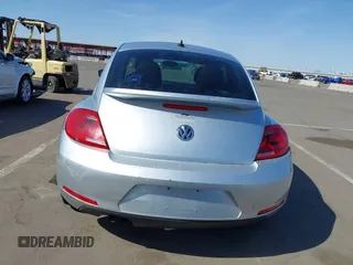2013 Volkswagen Beetle 2.5L w/Sun/Sound/Nav with VIN 3VWJX7AT5DM606119, listed as a IAAI auction lot 41970253 with 81,004 mi miles and . Bid and sale history available at DreamBid. Image 17.