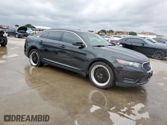 2014 Ford Taurus SHO z VIN 1FAHP2KT4EG106957, wystawiony jako Copart lot #59364185 z przebiegiem 113 704 mil mil oraz Szkoda całkowita • Salvage title. Historia ofert i sprzedaży dostępna na DreamBid. Obrazek 4.