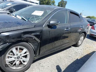 2017 Kia Optima LX z VIN KNAGT4L33H5156094, wystawiony jako IAAI lot #42405505 z przebiegiem 111 622 mil mil oraz . Historia ofert i sprzedaży dostępna na DreamBid. Obrazek 14.