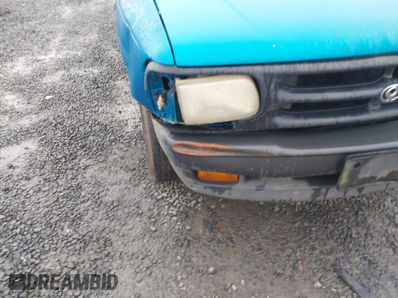 1995 Mazda B-Series Truck z VIN 4F4CR12A4STM06113, wystawiony jako IAAI lot #41674480 z przebiegiem 290 348 mil mil oraz . Historia ofert i sprzedaży dostępna na DreamBid. Obrazek 6.