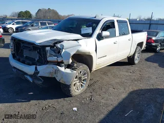 2016 Chevrolet Silverado 1500 LT with VIN 3GCUKREC6GG306239, listed as a IAAI auction lot 41380251 with 128,042 mi miles. Bid and sale history available at carsss.com. Image 20.