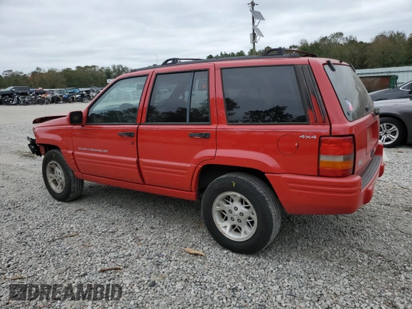 1998 Jeep Grand Cherokee Limited z VIN 1J4GZ78S0WC276411, wystawiony jako Copart lot #78200114 z przebiegiem 220 856 mil mil oraz Szkoda całkowita • Salvage title. Historia ofert i sprzedaży dostępna na DreamBid. Obrazek 2.