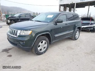 2011 Jeep Grand Cherokee Laredo with VIN 1J4RR4GG9BC546198, listed as a IAAI auction lot 41879387 with 190,973 mi miles. Bid and sale history available at carsss.com. Image 2.