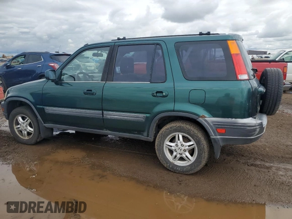 1999 Honda CR-V EX z VIN JHLRD1869XC064785, wystawiony jako Copart lot #58666215 z przebiegiem 241 633 mil mil oraz Czysty tytuł • Clean title. Historia ofert i sprzedaży dostępna na DreamBid. Obrazek 2.