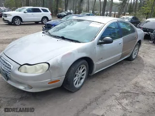 2001 Chrysler LHS with VIN 2C3HC56G81H540175, listed as a IAAI auction lot 41751981 with 212,941 mi miles. Bid and sale history available at carsss.com. Image 2.