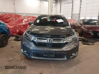 2018 Honda CR-V Touring with VIN 2HKRW2H91JH634457, listed as a IAAI auction lot 41697658 with 101,878 mi miles. Bid and sale history available at carsss.com. Image 13.