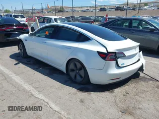 2018 Tesla Model 3 Long Range Battery with VIN 5YJ3E1EA3JF057527, listed as a IAAI auction lot 42072126 with 1 mi miles. Bid and sale history available at carsss.com. Image 3.