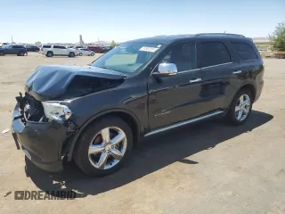 2013 Dodge Durango Citadel with VIN 1C4RDJEG4DC676544, listed as a Copart auction lot 57597015 with 135,776 mi miles and Salvage title. Bid and sale history available at DreamBid. Image 1.