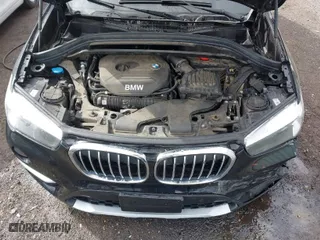 2018 BMW X1 xDrive28i with VIN WBXHT3C35J5L34646, listed as a IAAI auction lot 41725131 with 81,983 mi miles. Bid and sale history available at carsss.com. Image 10.