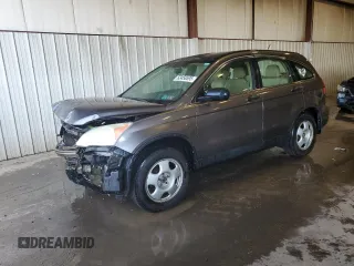 2010 Honda CR-V LX with VIN 5J6RE4H33AL057656, listed as a Copart auction lot 63458595 with 114,416 mi miles and Salvage title. Bid and sale history available at DreamBid. Image 1.