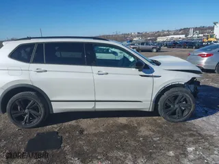 2023 Volkswagen Tiguan SE R-Line Black with VIN 3VVCB7AX8PM141998, listed as a IAAI auction lot 41278010 with 230,000 mi miles. Bid and sale history available at carsss.com. Image 14.
