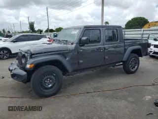 2023 Jeep Gladiator Sport with VIN 1C6HJTAG6PL584627, listed as a Copart auction lot 65161815 with 7,020 mi miles and Clean title. Bid and sale history available at DreamBid. Image 1.