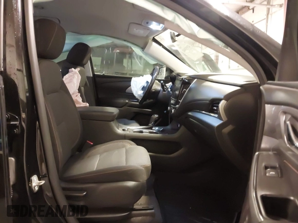 2018 Chevrolet Traverse LT Cloth z VIN 1GNEVGKW2JJ232734, wystawiony jako IAAI lot #41931040 z przebiegiem 91 580 mil mil oraz . Historia ofert i sprzedaży dostępna na DreamBid. Obrazek 5.