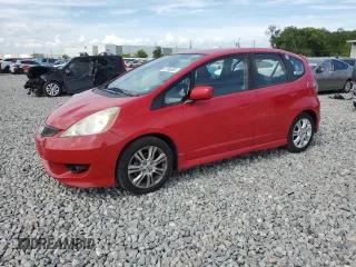 2009 Honda Fit Sport z VIN JHMGE88419S056101, wystawiony jako Copart lot #61596955 z przebiegiem 108 636 mil mil oraz Czysty tytuł • Clean title. Historia ofert i sprzedaży dostępna na DreamBid. Obrazek 1.