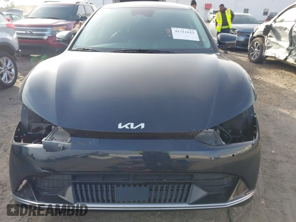2023 Kia EV6 Wind z VIN KNDC34LA9P5127293, wystawiony jako IAAI lot #41711613 z przebiegiem 12 365 mil mil oraz . Historia ofert i sprzedaży dostępna na DreamBid. Obrazek 13.