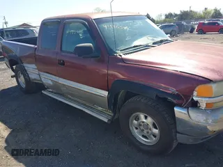 1999 GMC New Sierra 1500 SLE with VIN 2GTEK19T3X1525779, listed as a IAAI auction lot 41986559 with 254,123 mi miles. Bid and sale history available at carsss.com. Image 6.