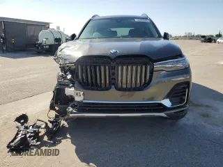 2021 BMW X7 xDrive40i z VIN 5UXCW2C04M9F03701, wystawiony jako Copart lot #52409985 z przebiegiem Nie podano mil oraz Szkody całkowita. Historia ofert i sprzedaży dostępna na DreamBid. Obrazek 5.