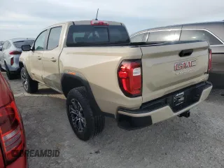 2023 GMC Canyon 4WD AT4 with VIN 1GTP6DEK3P1151112, listed as a Copart auction lot 77150454 with 5,573 mi miles and Non Repairable. Bid and sale history available at carsss.com. Image 2.