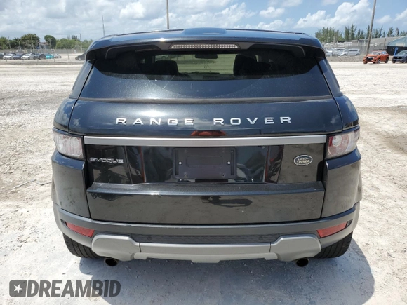 2014 Land Rover Range Rover Evoque Pure Premium z VIN SALVR2BG1EH896666, wystawiony jako Copart lot #58449085 z przebiegiem Nie podano mil oraz Szkoda całkowita • Salvage title. Historia ofert i sprzedaży dostępna na DreamBid. Obrazek 6.