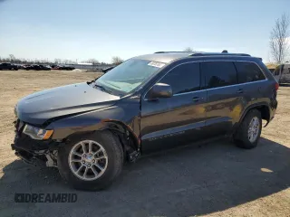 2020 Jeep Grand Cherokee Laredo E with VIN 1C4RJFAG8LC398824, listed as a Copart auction lot 50787635 with 101,147 mi miles and Salvage title. Bid and sale history available at DreamBid. Image 1.