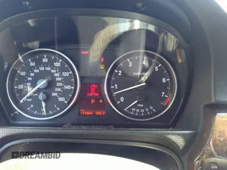 2008 BMW 3 Series 328i with VIN WBAVA37588NL53989, listed as a IAAI auction lot 38807371 with 179,844 mi miles. Bid and sale history available at carsss.com. Image 7.