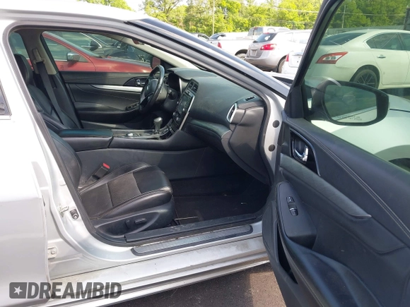 2017 Nissan Maxima SR with VIN 1N4AA6APXHC426651, listed as a IAAI auction lot 42242002 with 155,824 mi miles and . Bid and sale history available at DreamBid. Image 5.