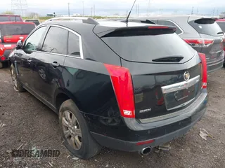 2014 Cadillac SRX Luxury Collection with VIN 3GYFNBE35ES569527, listed as a IAAI auction lot 41952555 with 152,978 mi miles and . Bid and sale history available at carsss.com. Image 3.