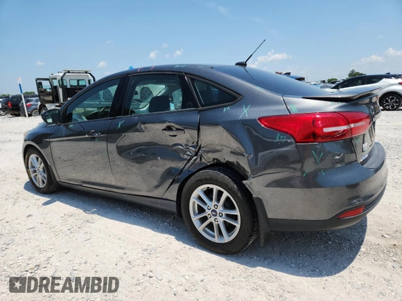 2018 Ford Focus SE with VIN 1FADP3F25JL331038, listed as a Copart auction lot 60235395 with 37,038 mi miles and Salvage title. Bid and sale history available at DreamBid. Image 2.