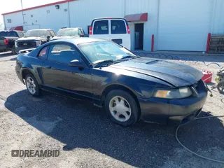 2004 Ford Mustang Standard with VIN 1FAFP40604F156534, listed as a IAAI auction lot 41794486 with 216,207 mi miles. Bid and sale history available at carsss.com. Image 1.