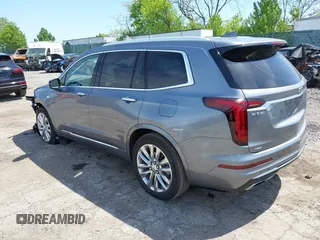2022 Cadillac XT6 Premium Luxury z VIN 1GYKPDRS4NZ146284, wystawiony jako IAAI lot #42150678 z przebiegiem 28 890 mil mil oraz . Historia ofert i sprzedaży dostępna na DreamBid. Obrazek 3.