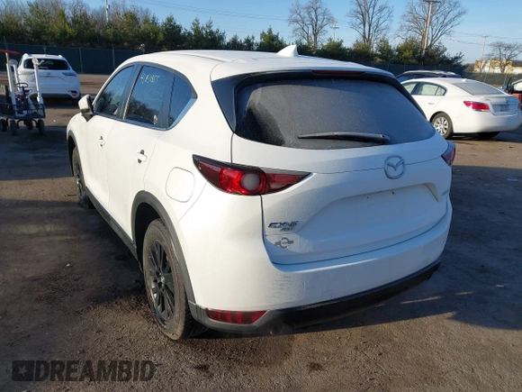 2017 Mazda CX-5 Touring with VIN JM3KFBCL8H0136601, listed as a IAAI auction lot 41830355 with 113,677 mi miles. Bid and sale history available at carsss.com. Image 3.