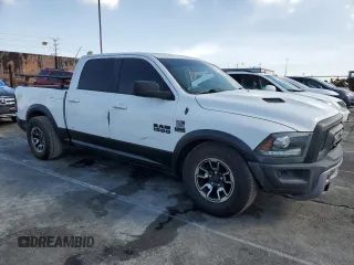 2018 Ram 1500 Rebel with VIN 1C6RR7YT7JS235965, listed as a Copart auction lot 56193005 with 61,485 mi miles and Salvage title. Bid and sale history available at DreamBid. Image 4.