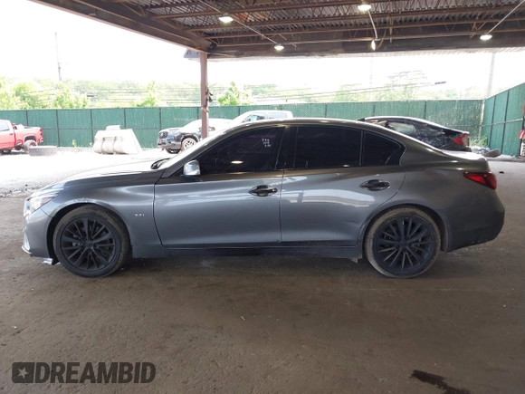 2019 Infiniti Q50 Luxe z VIN JN1EV7AR8KM594171, wystawiony jako IAAI lot #42428037 z przebiegiem 70 086 mil mil oraz . Historia ofert i sprzedaży dostępna na DreamBid. Obrazek 14.