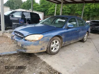 2002 Ford Taurus SE Standard z VIN 1FAFP53U82G140220, wystawiony jako Copart lot #55839555 z przebiegiem 207 693 mil mil oraz Szkoda całkowita • Salvage title. Historia ofert i sprzedaży dostępna na DreamBid. Obrazek 1.