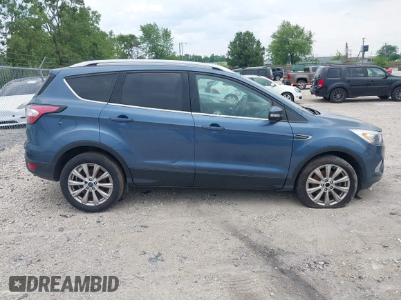 2018 Ford Escape Titanium z VIN 1FMCU0J91JUC00941, wystawiony jako IAAI lot #42679897 z przebiegiem 110 884 mil mil oraz . Historia ofert i sprzedaży dostępna na DreamBid. Obrazek 13.
