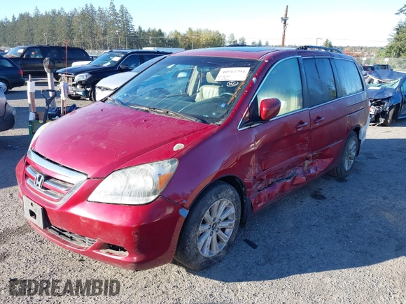 2005 Honda Odyssey TOURING with VIN 5FNRL38815B008644, listed as a IAAI auction lot 40512794 with 279,981 mi miles. Bid and sale history available at carsss.com. Image 2.