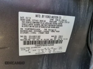 2014 Ford Taurus Limited with VIN 1FAHP2F8XEG163430, listed as a Copart auction lot 55357205 with 150,841 mi miles and Salvage title. Bid and sale history available at DreamBid. Image 12.