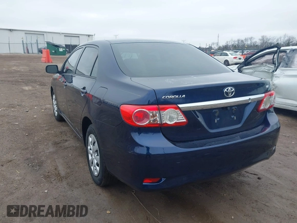 2012 Toyota Corolla L with VIN 5YFBU4EE4CP031190, listed as a IAAI auction lot 42015131 with 210,689 mi miles. Bid and sale history available at carsss.com. Image 3.