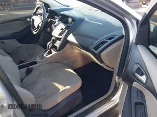 2018 Ford Focus SE z VIN 1FADP3F27JL204873, wystawiony jako IAAI lot #41657504 z przebiegiem 99 224 mil mil oraz . Historia ofert i sprzedaży dostępna na DreamBid. Obrazek 5.